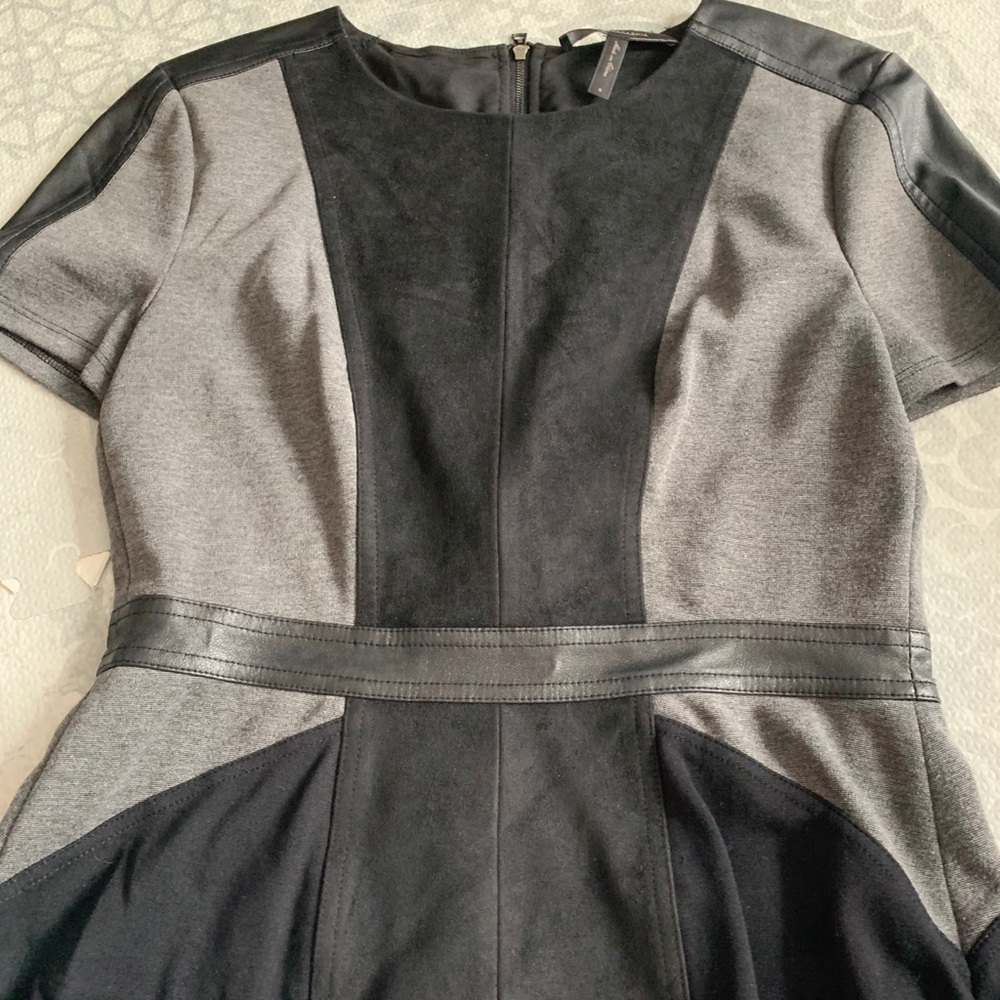 Jersey and suede short sleeve BCBG peplum top